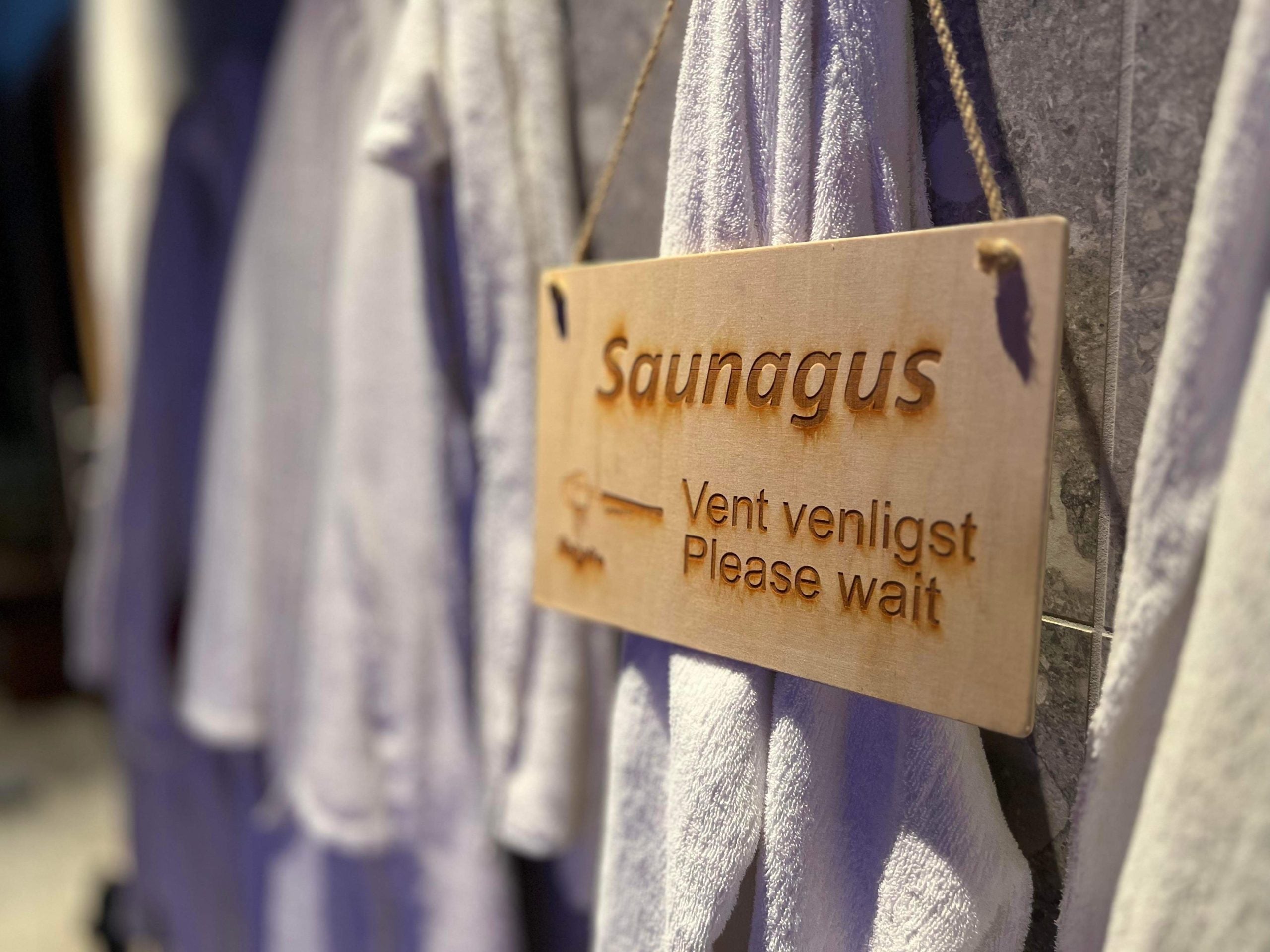 Saunagus dørskilt
